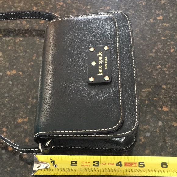 Lovely, Mint condition black leather Kate Spade crossbody purse. - Picture 5 of 10